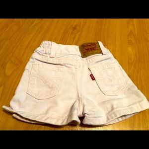 Light pink vintage high rise Levi shorts 18m